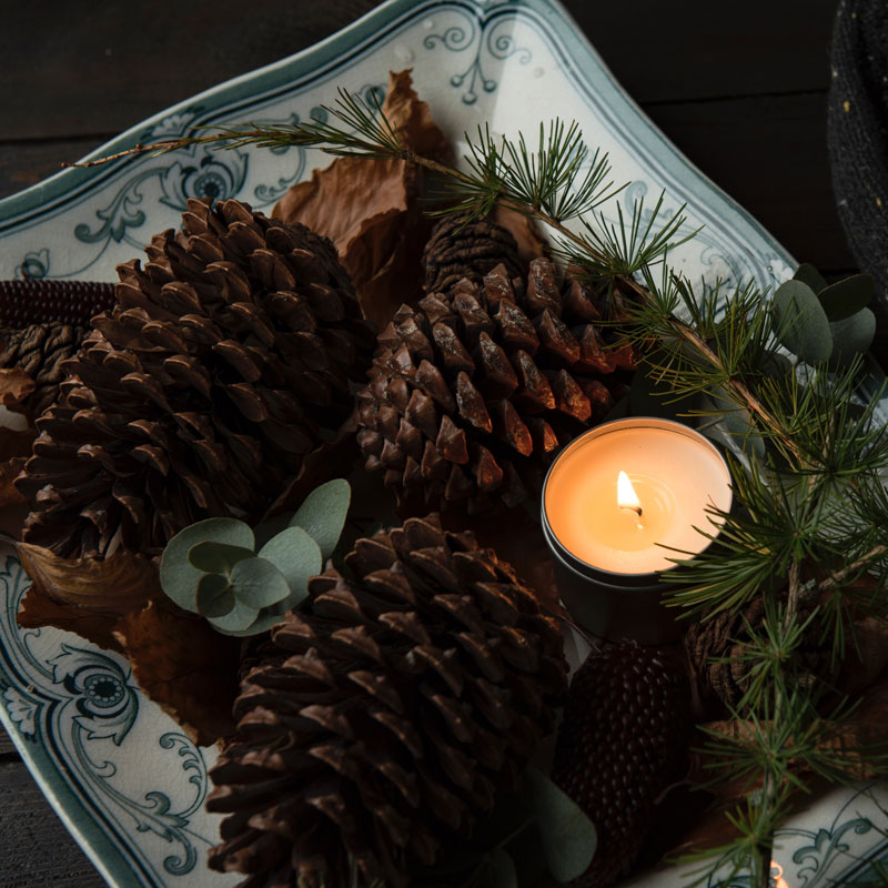 Christmas pine cones and candle
