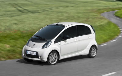 Electric car on country road