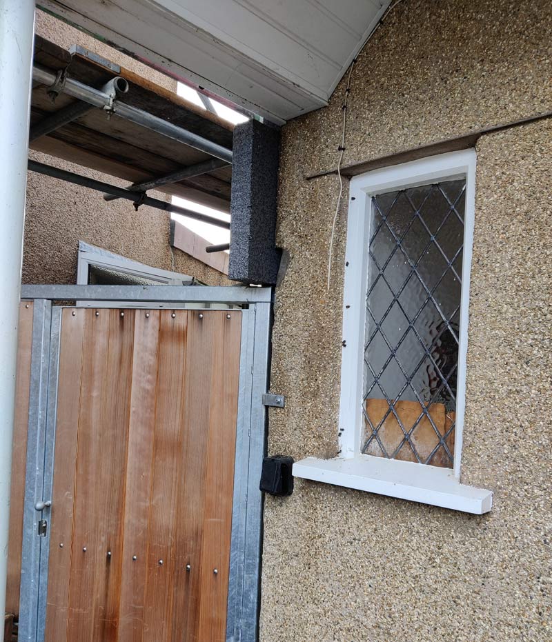 Original exterior before insulation has been installed.