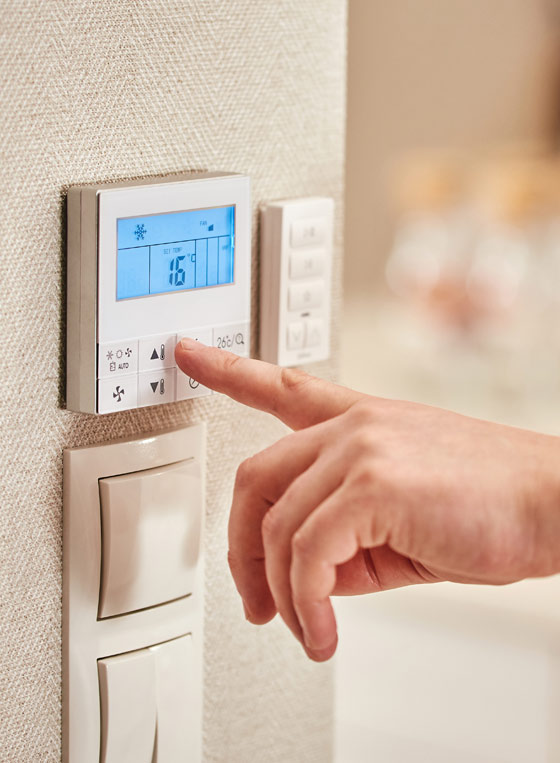 Turning down the room thermostat temperature