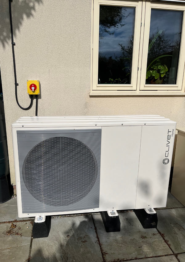Heat pump unit outside house