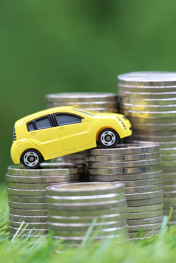 Car on stack of coins