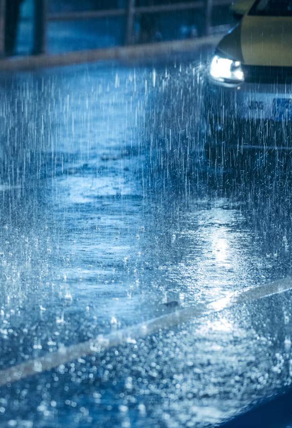 Heavy rain on city road